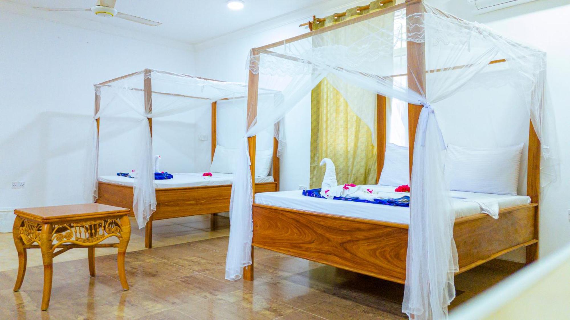 Sands Inn Hotel Pwani Mchangani Extérieur photo